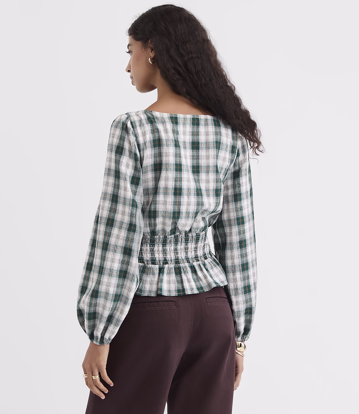 Plaid peplum top styled for an everyday outfit