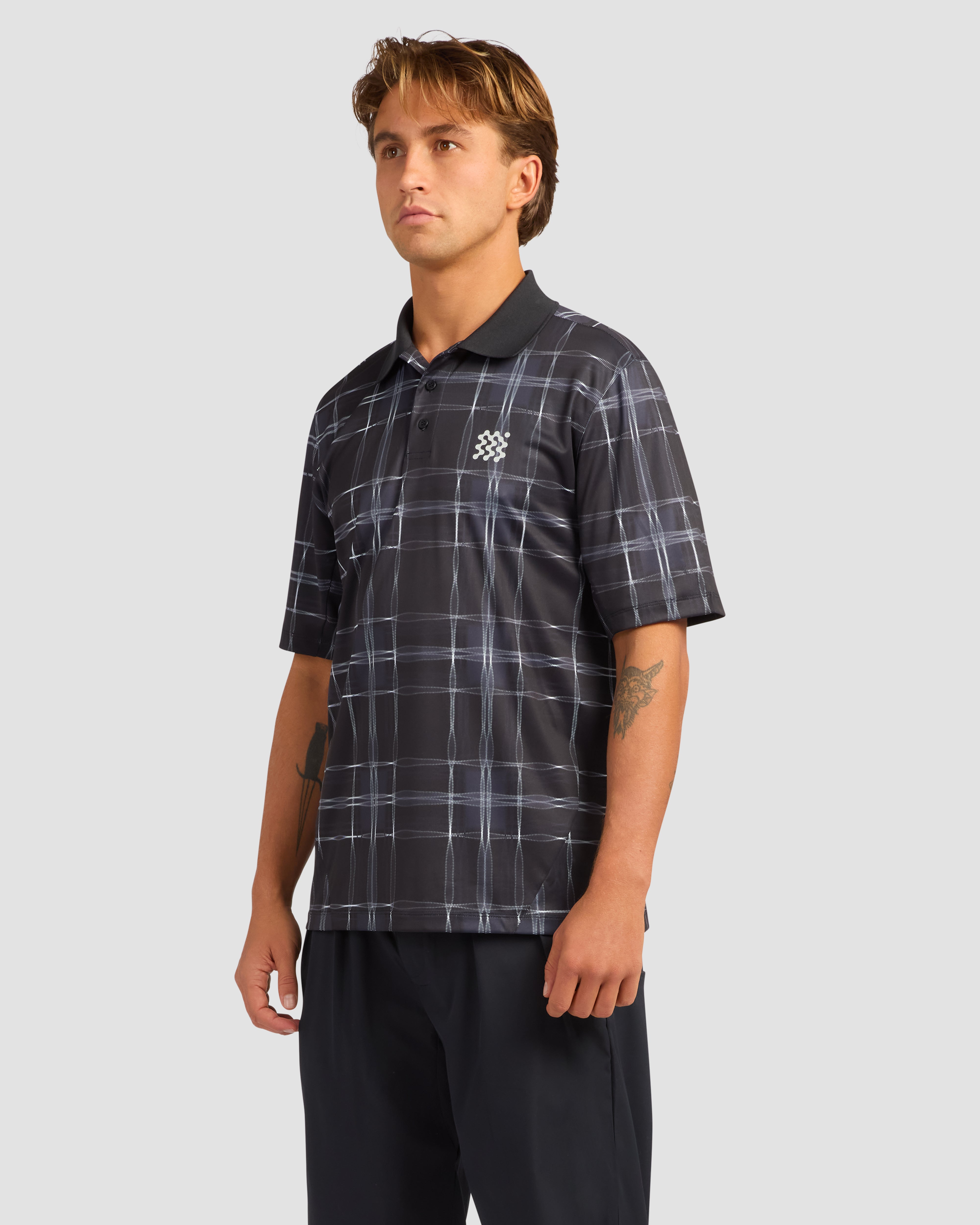 Jolidee Black Heritage Check Polo featuring a subtle pattern for a refined traditional golf look