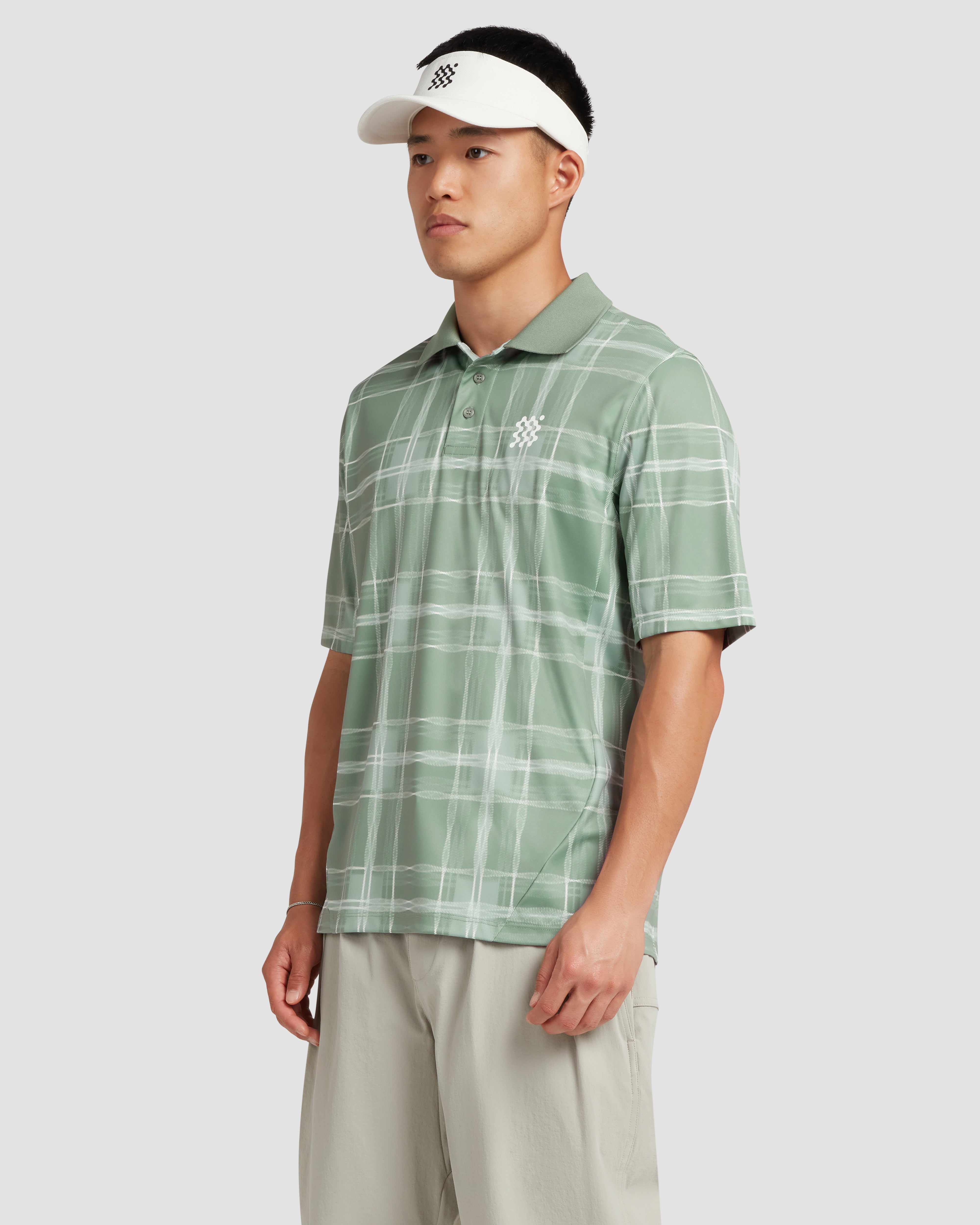 Jolidee Sage Tartan Heritage Check Polo offering a classic aesthetic for the 2026 golf collection