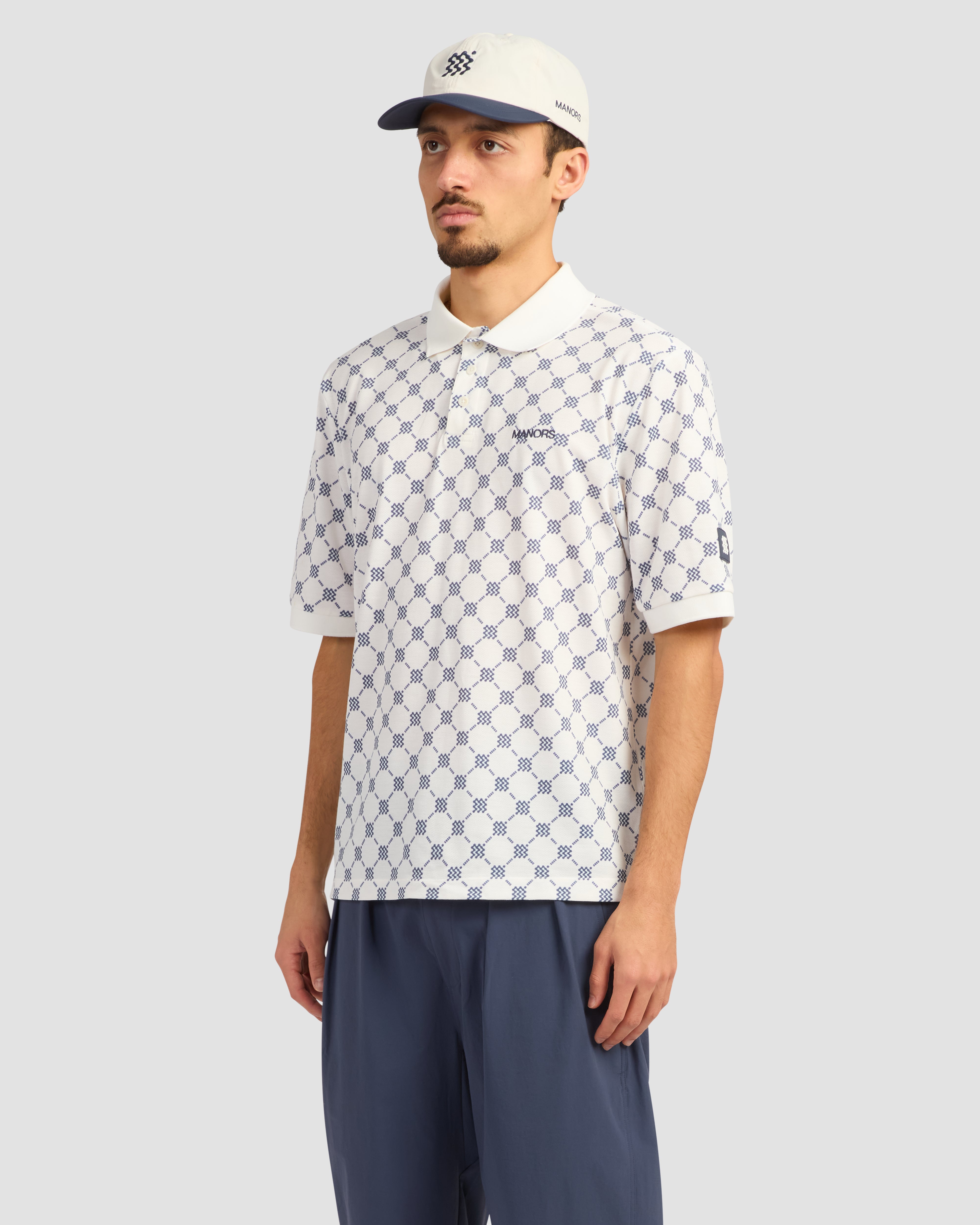 Jolidee Cream GOAT Pique Polo offering a luxurious monogrammed finish for your golf merch