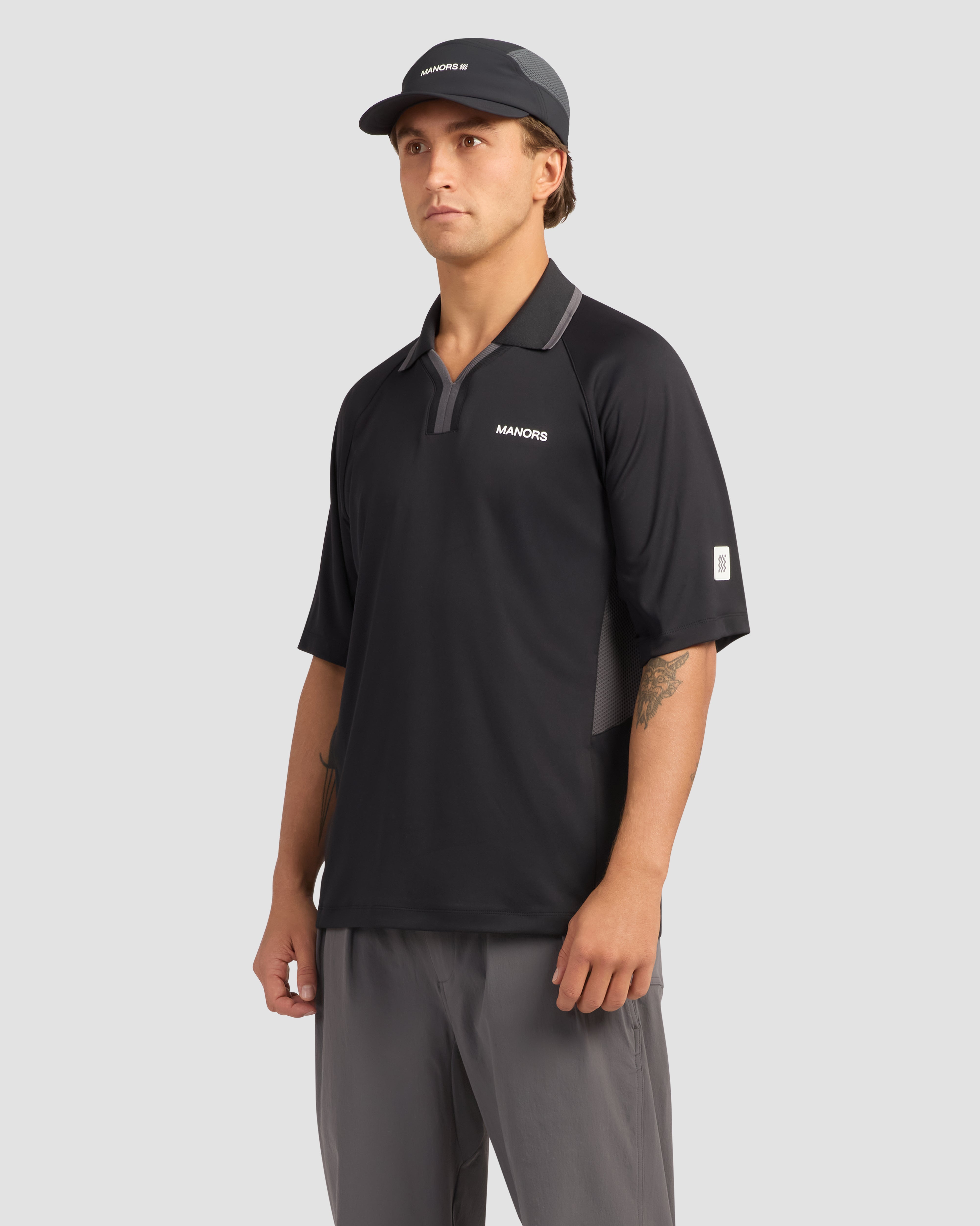Jolidee Black Club Polo engineered for versatile wear from the driving range to the clubhouse