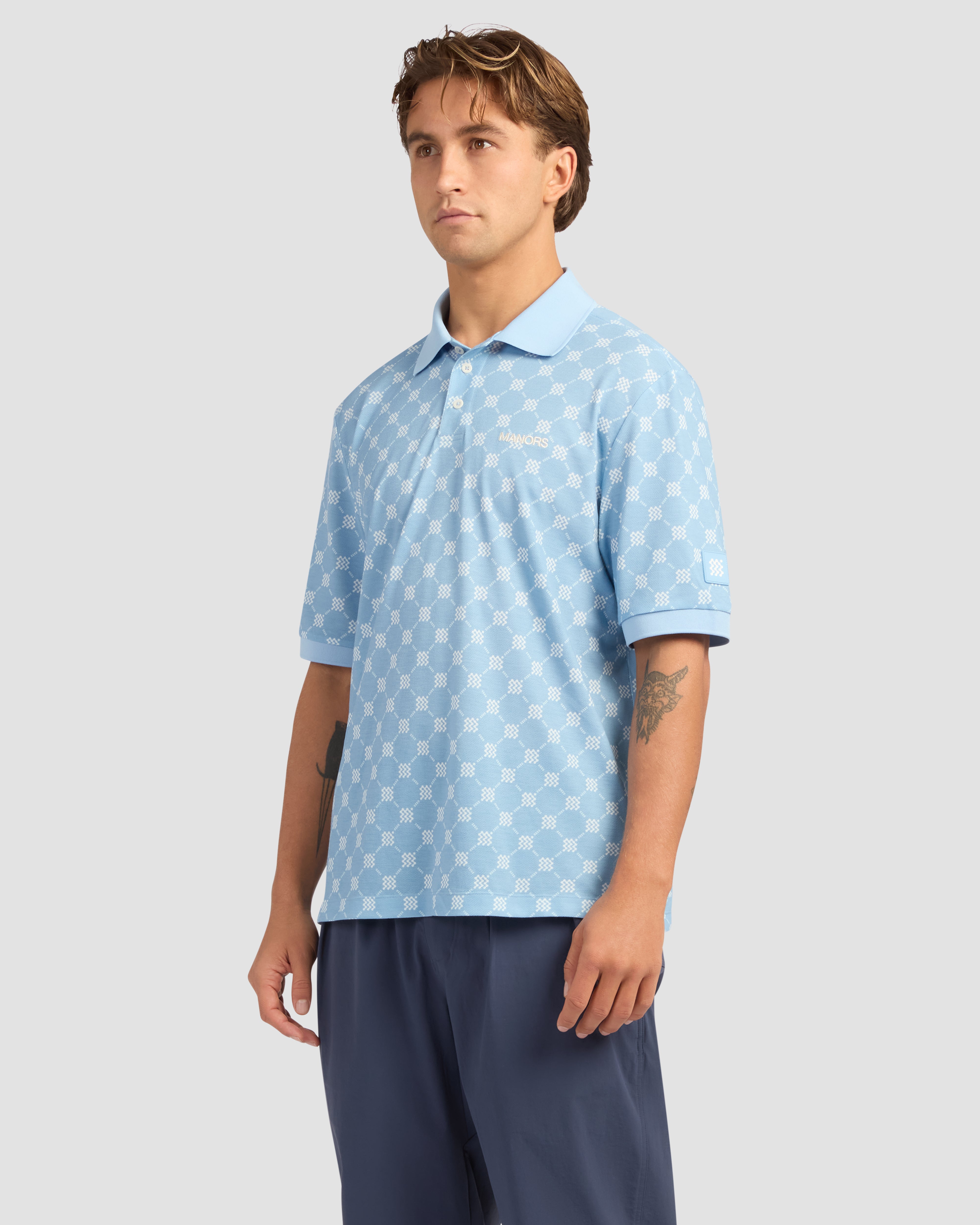 Jolidee Sky Blue GOAT Pique Polo featuring premium monogram embroidery for elite players