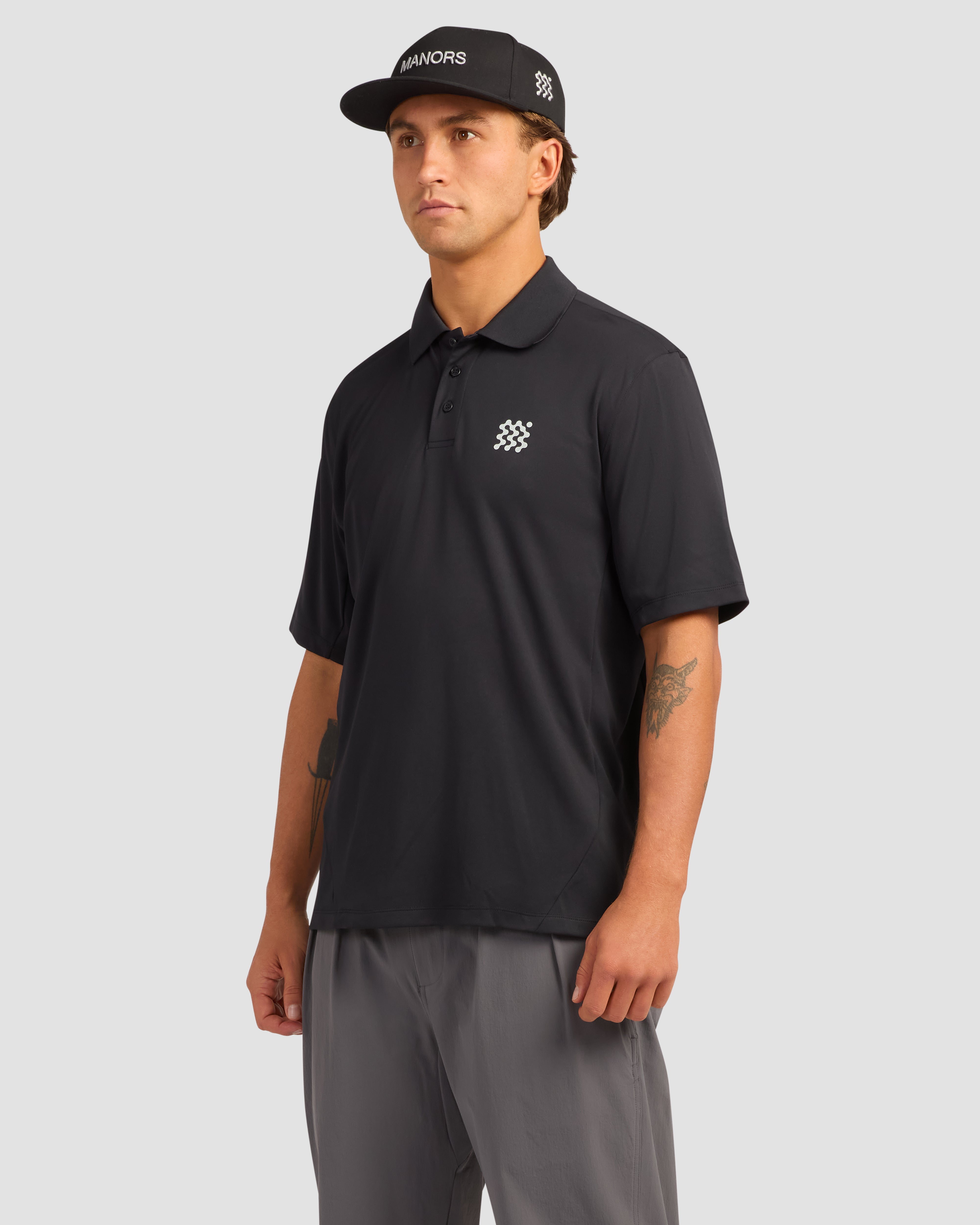 Classic Black Jolidee Course Polo offering premium comfort and a sleek look for every golfer