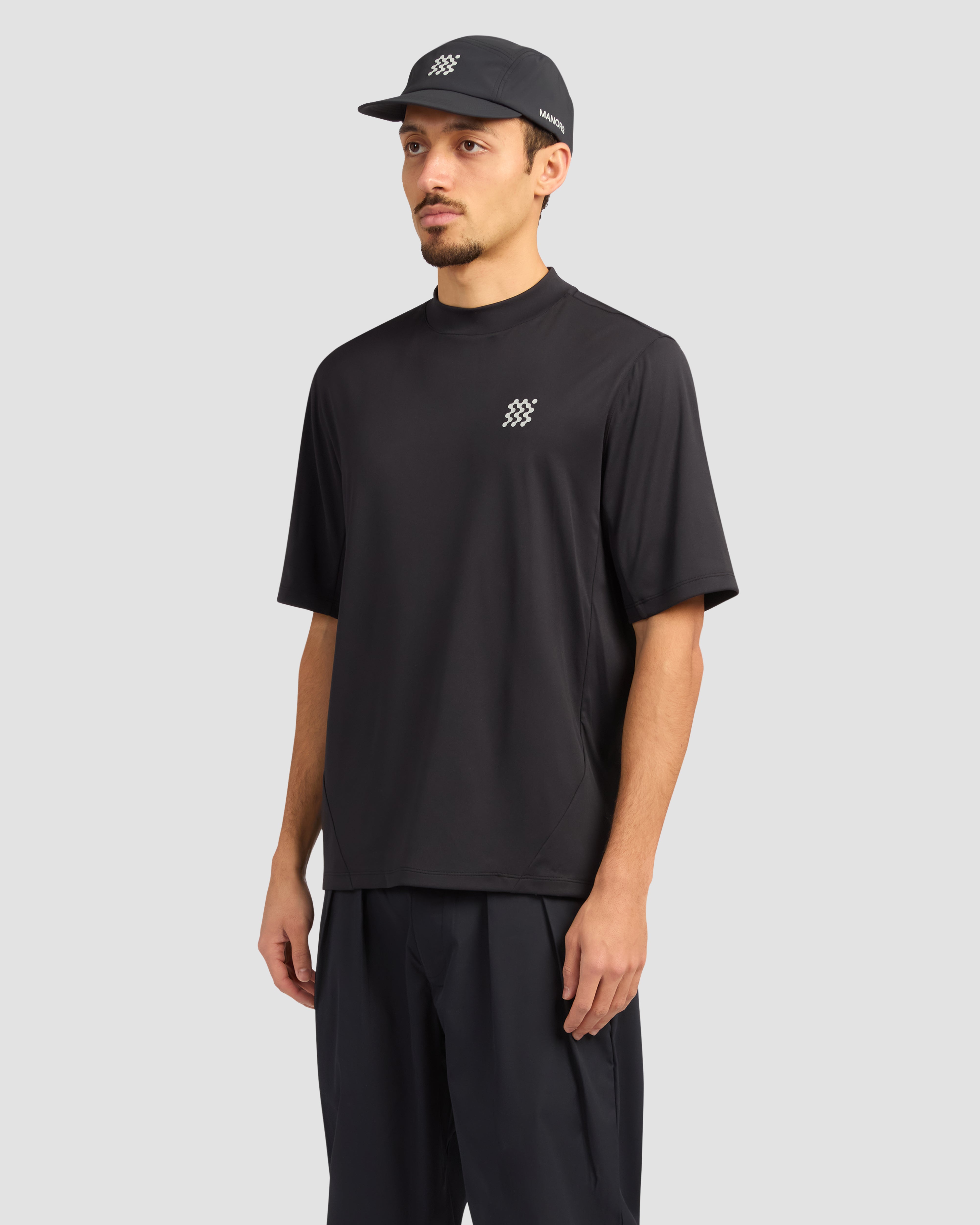 Jolidee Black Mockneck Course Polo designed for golfers seeking a sleek trendsetting look