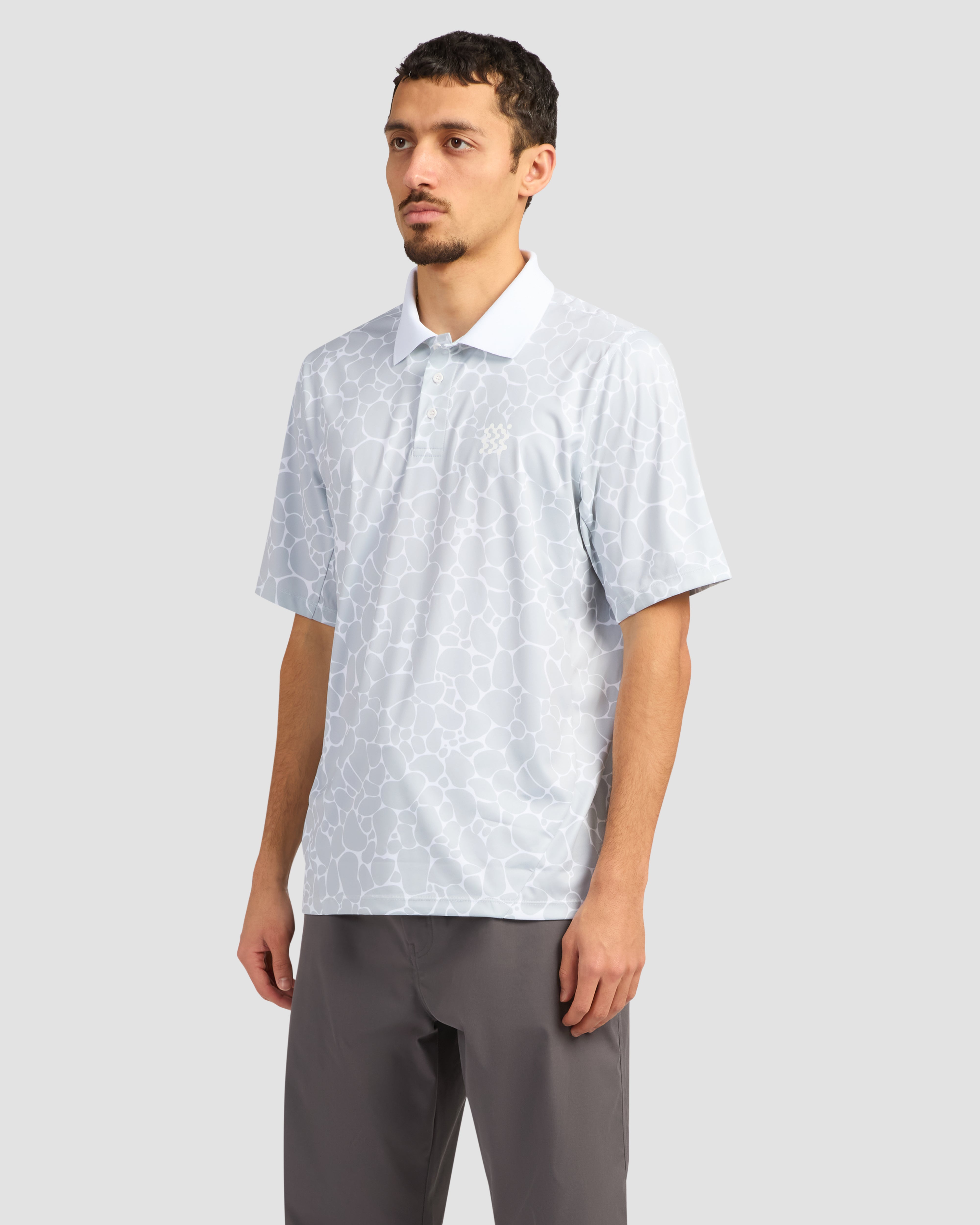 Jolidee White Pebble Course Polo featuring a unique textured fabric for premium golf style