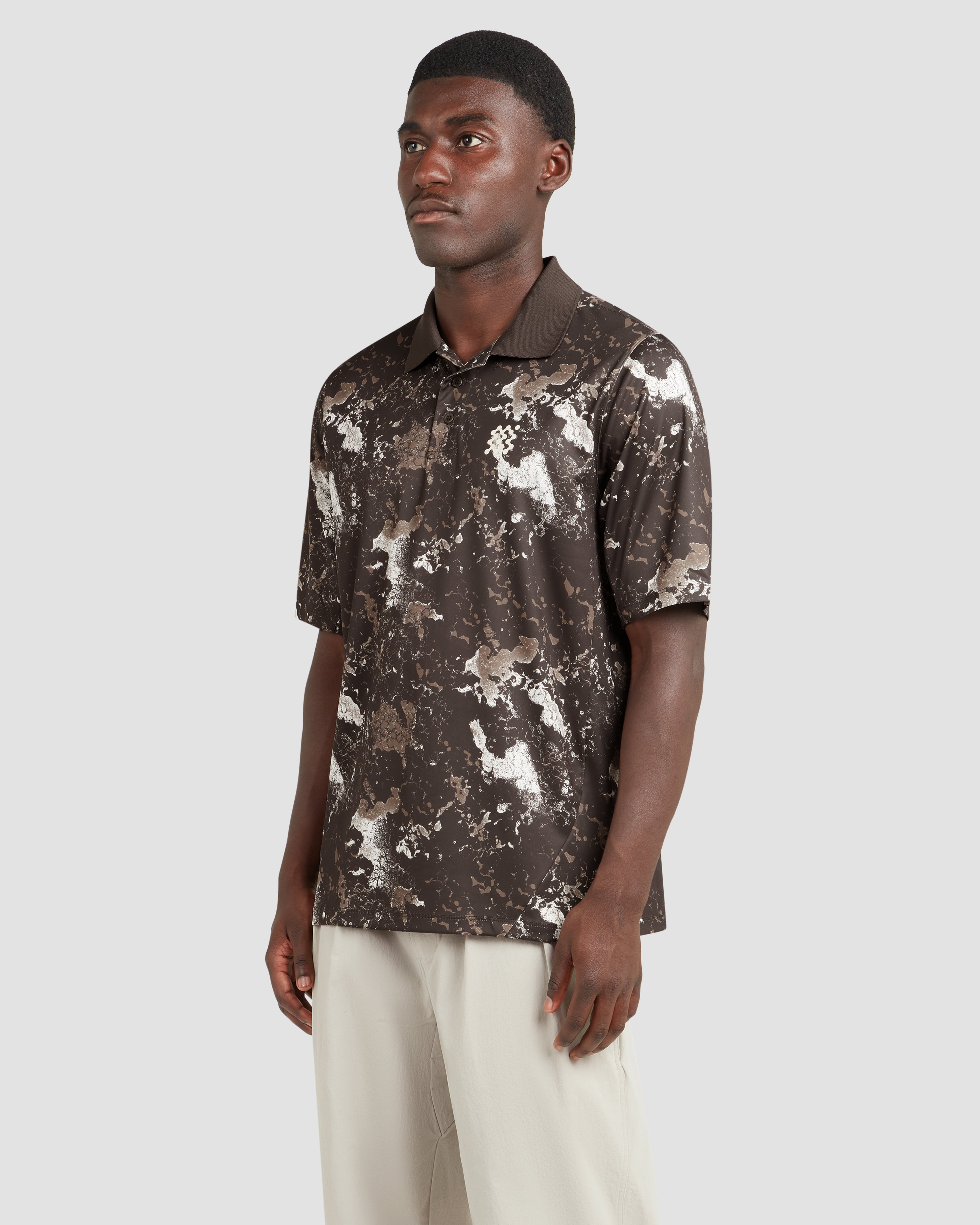 Jolidee Woodland Camo Course Polo featuring breathable fabric for a modern outdoor golf style