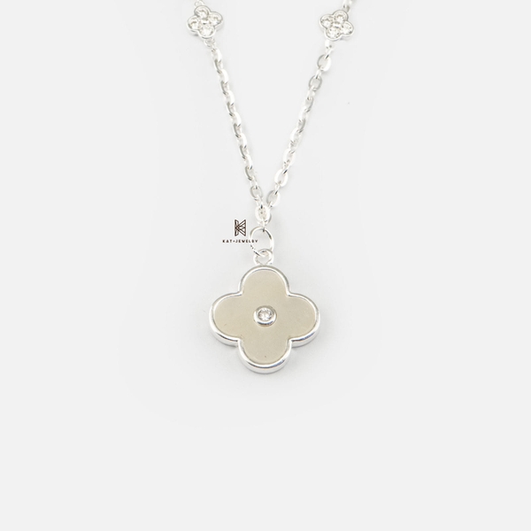 SNEEBER SINGLE CLOVER LEAF MOTHER OF PEARL AND DOUBLE SMALL CZ CLOVER LEAF