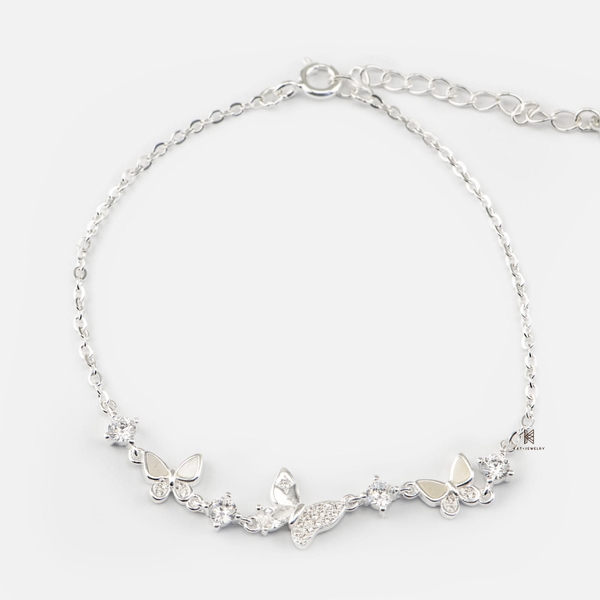 SNEEBER TRIPLE BUTTERFLY MOTHER OF PEARL AND 4 CZ GEM
